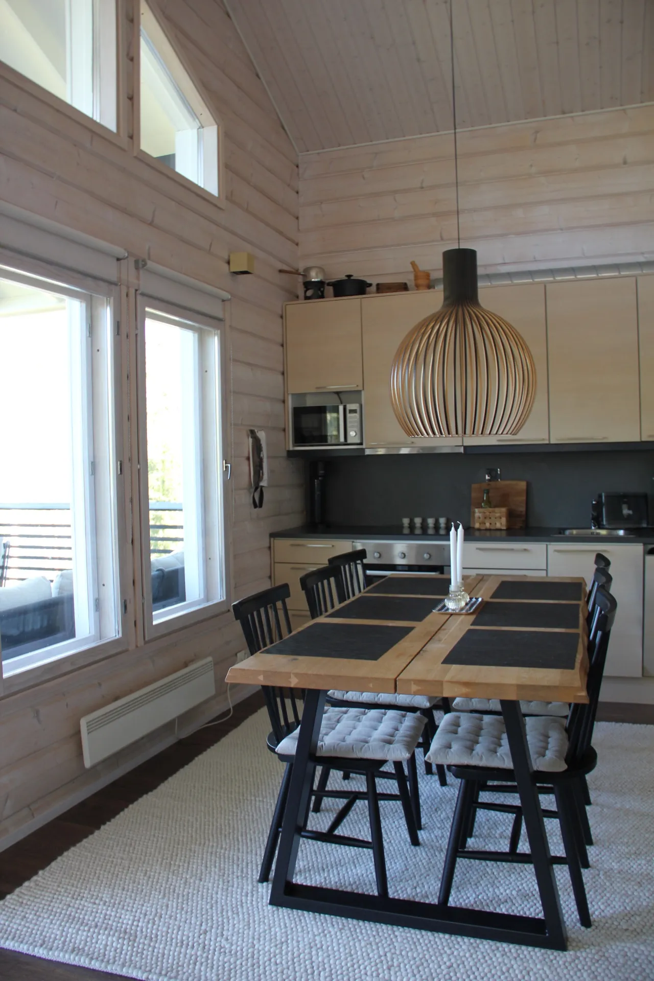 Kitchen and dining area with vaulted ceiling
