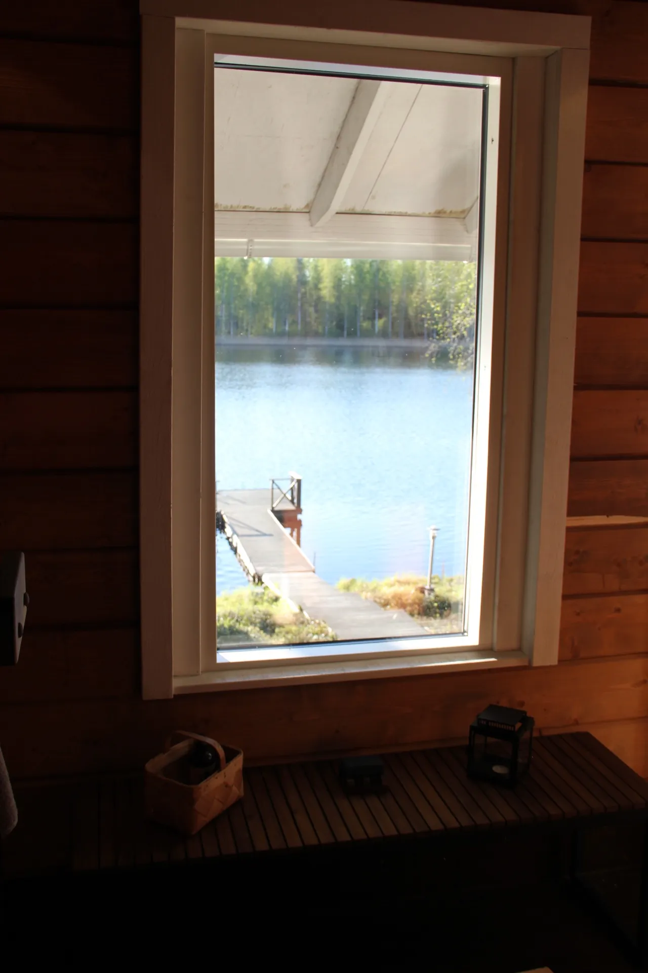 Window view to the dock from the sauna